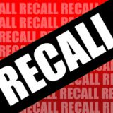 recall spelled with white letters over a black box and red background